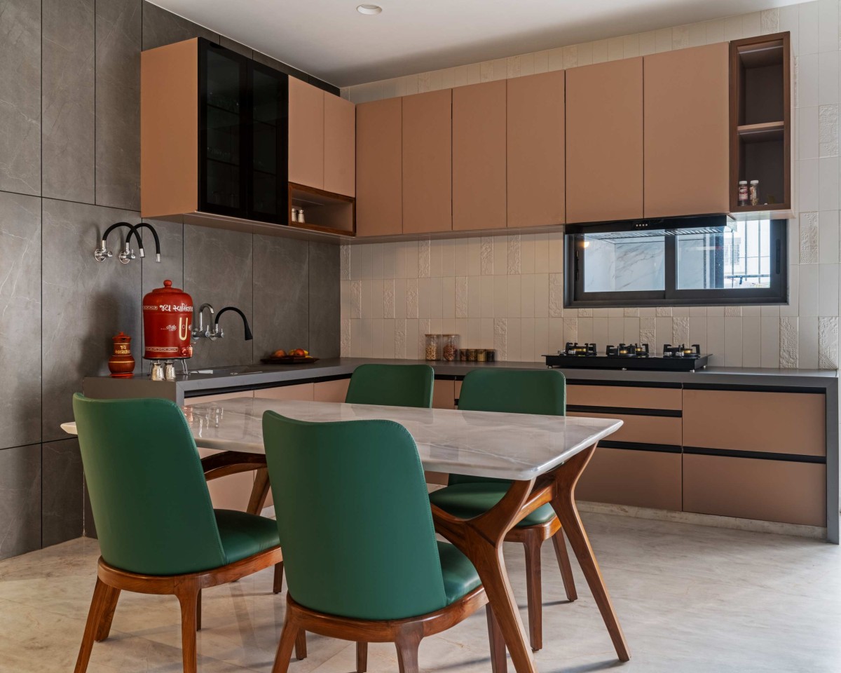 Dining and Kitchen of Nilkanth Bunglow by Mordhar Architects