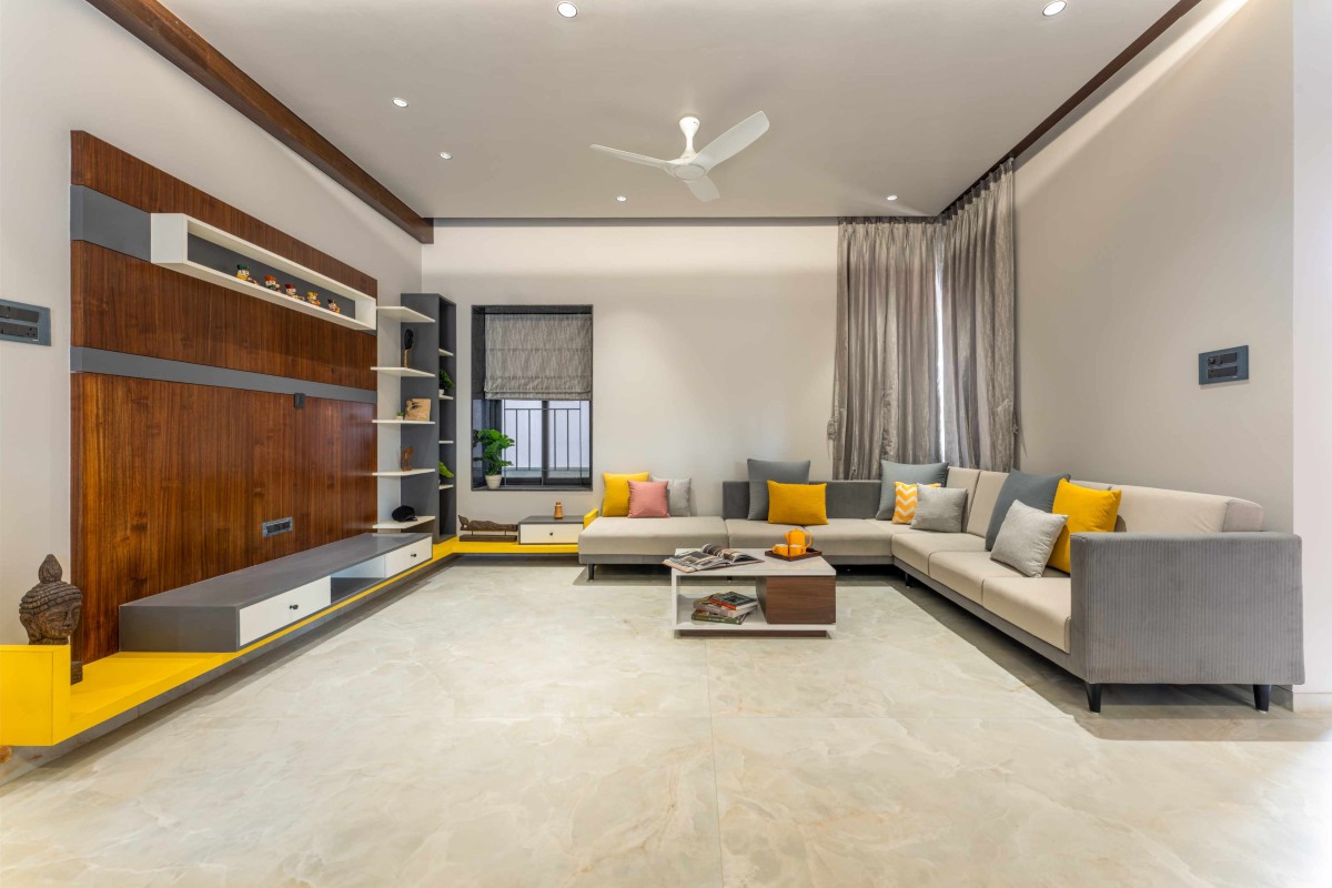 Living room of House of Parallel Walls by Aakar Group of Consultancy