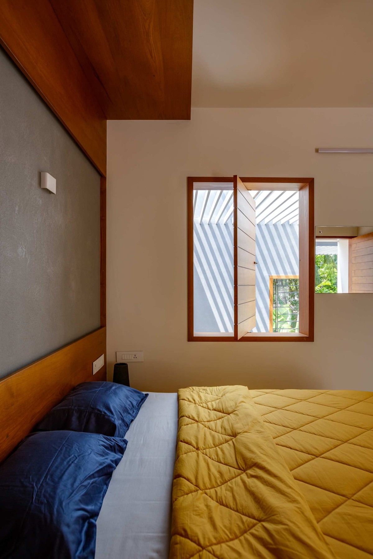 First Floor Bedroom 2 of Float-en-Fold House by architecture.SEED