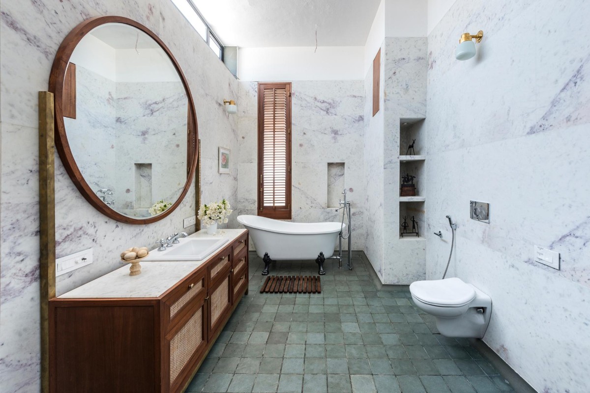 Bathroom of House with the Soaring Rock by SPASM Design Architects