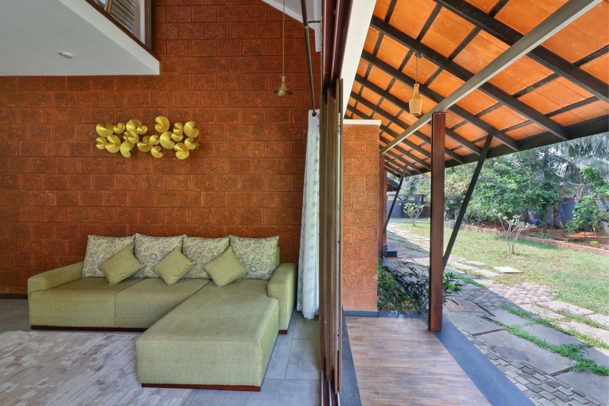 Living and Outdoor deck of Our Space by Satkriya Architecture