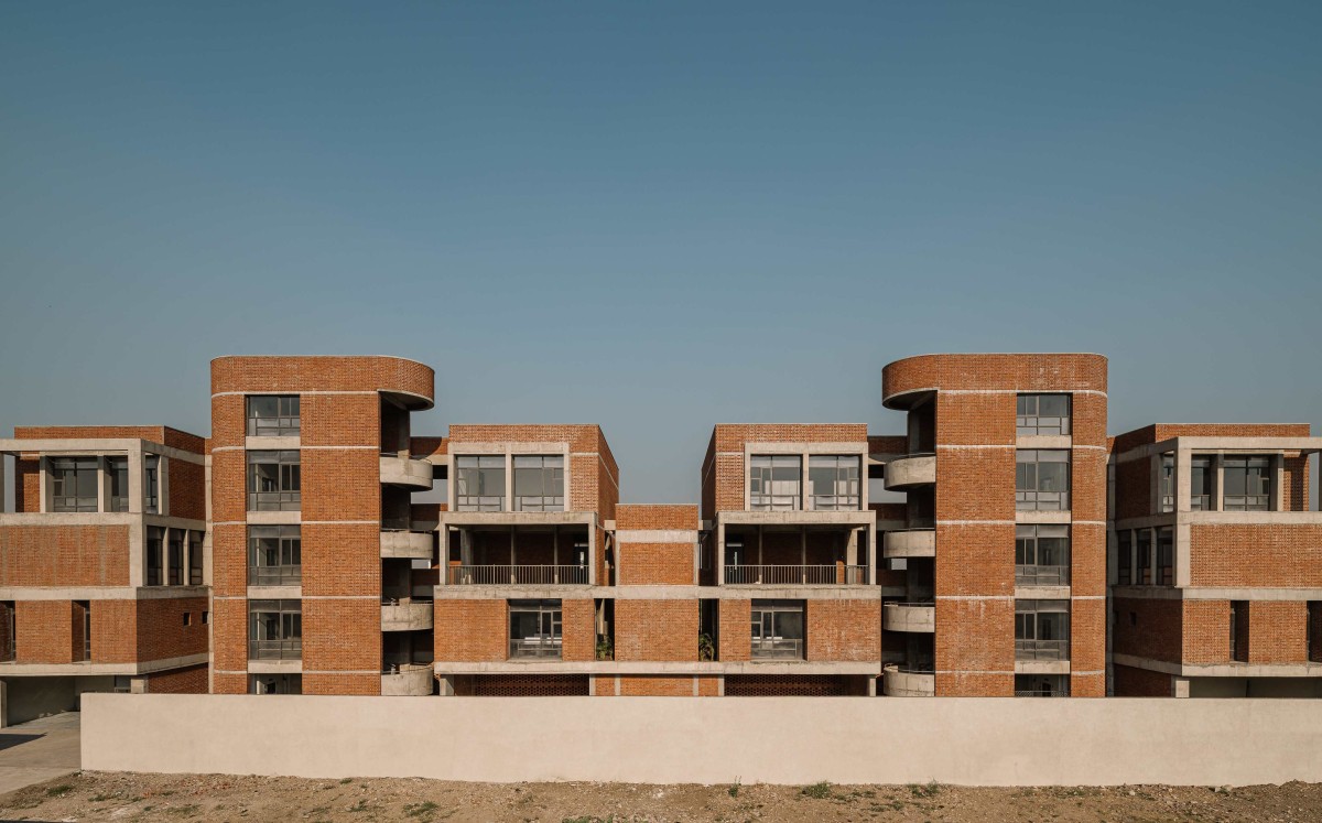 Exterior view of Girl’s college & hostel for Model education trust by Neogenesis+Studi0261