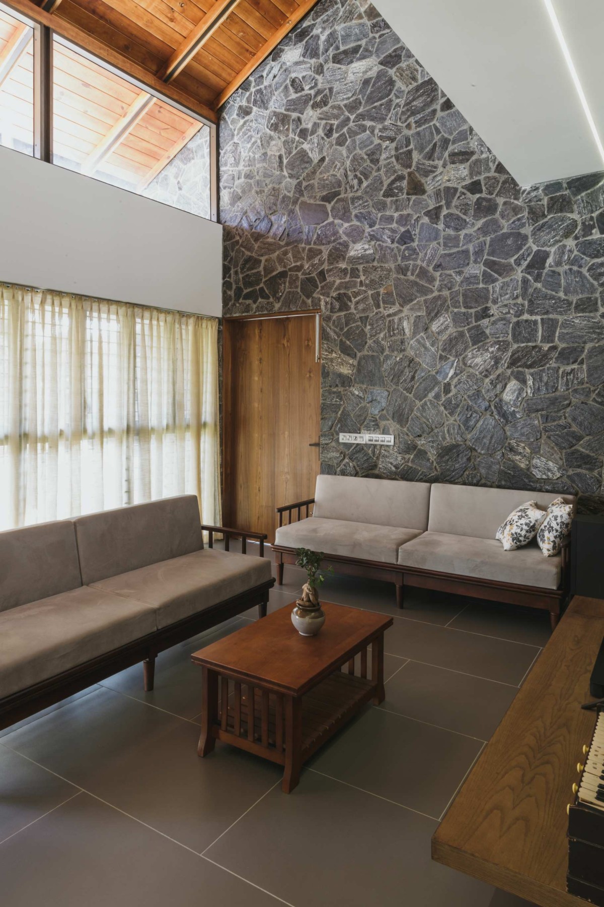 Living room of Aruvi by Casa Design Studio