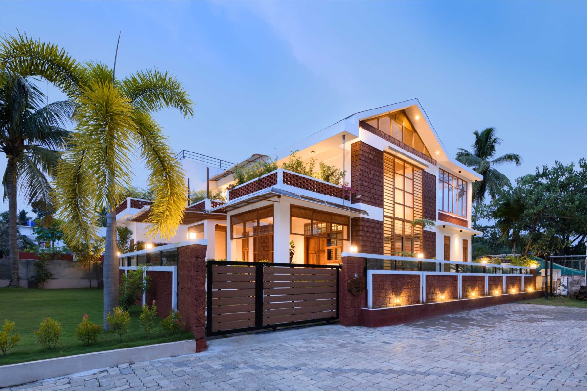 Dusk light exterior view of Villa by the Backwaters by Studio TAB