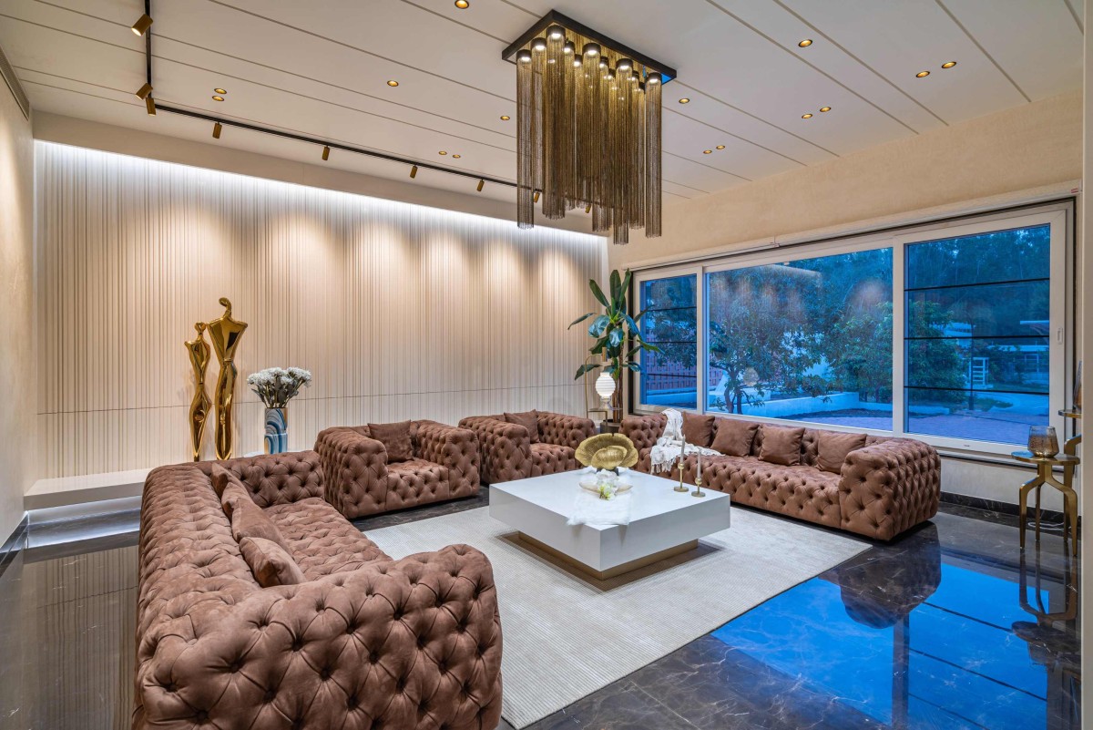 Formal living room of Sri Sri Villa by Ace Associates