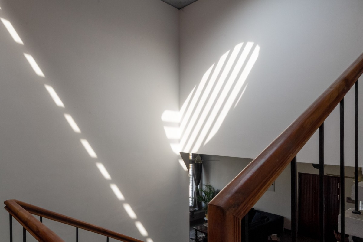 Skylights from roof creating everchanging play of shadows inside the house