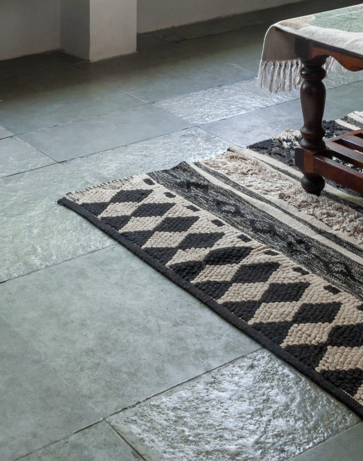 Textured Kota stone flooring adding tactile appeal to the space