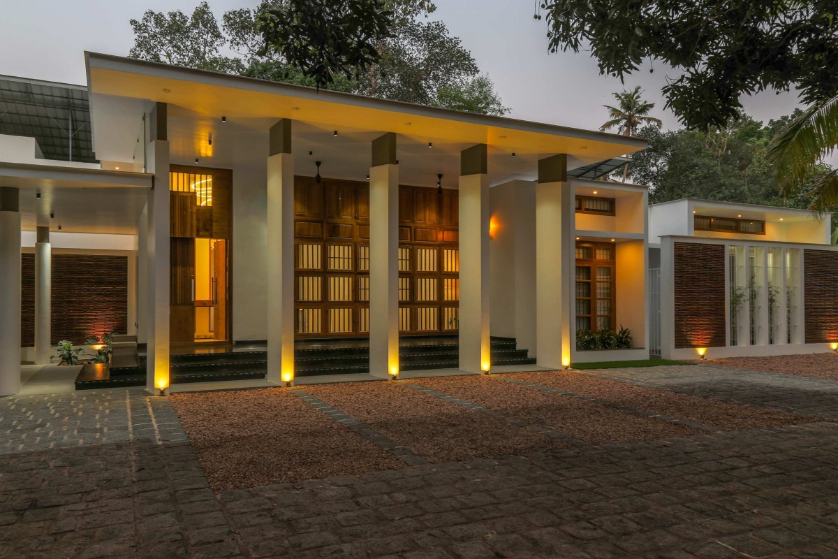 Dusk light exterior view of House of Volumes by PRAJC Design Consultants LLP