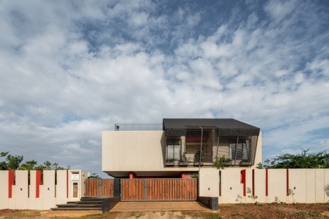 The Red Courtyard House by Jacob + Rathodi Architects