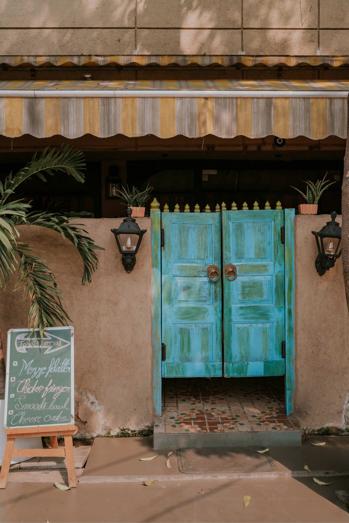 Entrance of Cafe Lambreta by Interior Ozal Design Studio