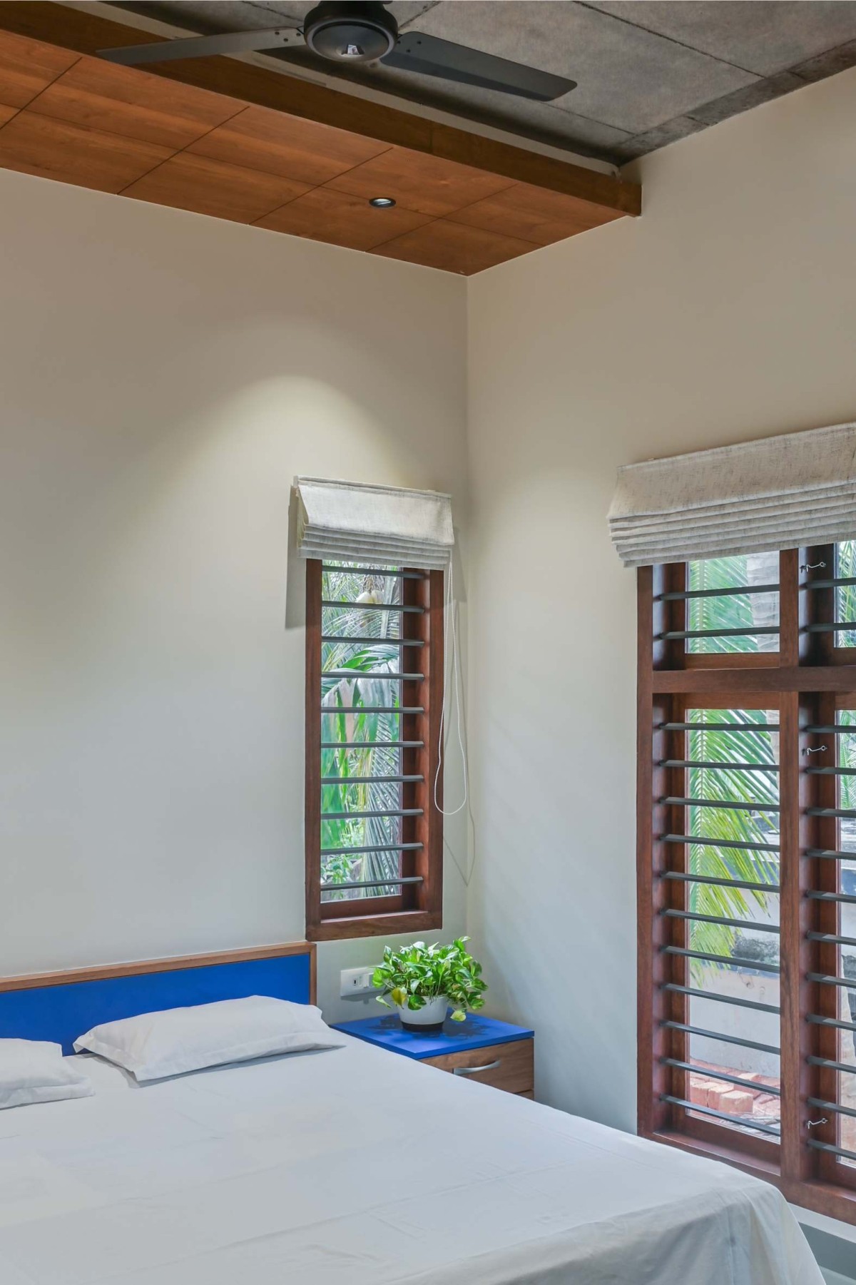 Bedroom 4 of Brick Screen House by HONEYCOMB Architects