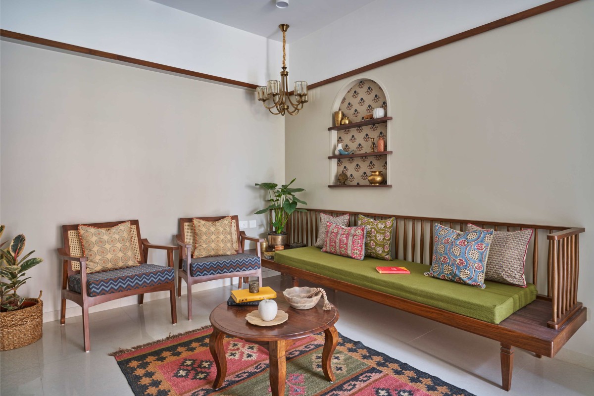 Living room of Kshitija & Rakesh Patil Residence by INI Studio