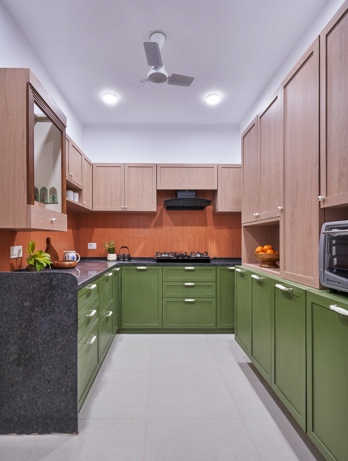 Kitchen of Kshitija & Rakesh Patil Residence by INI Studio