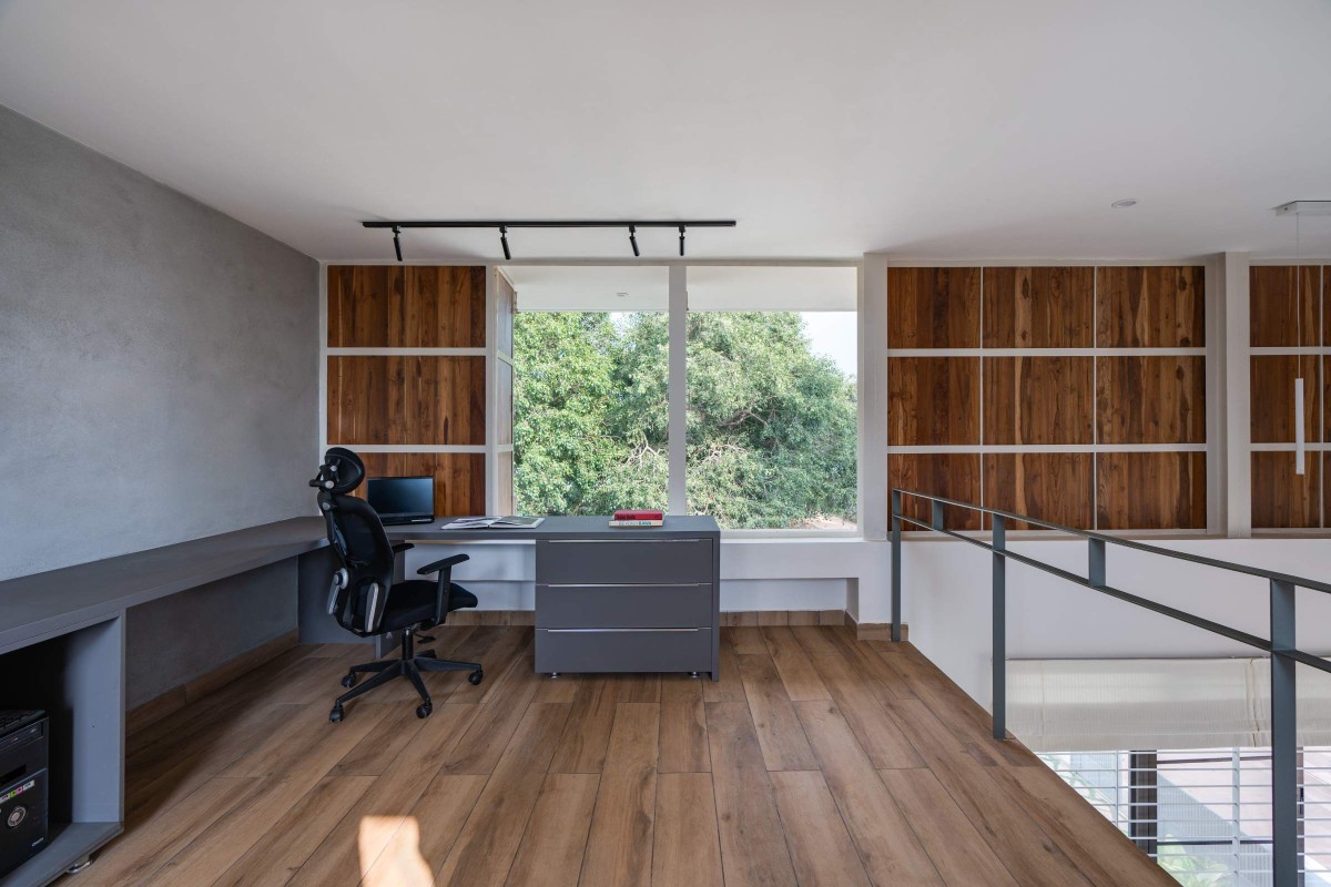 Mezzanine Study Area of The Modern Pastoral House by Sudaiva Studio