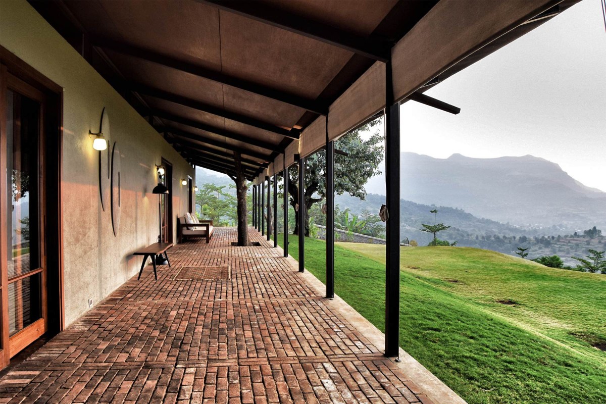 Verandah of The House with the Gabion by SPASM Design Architects