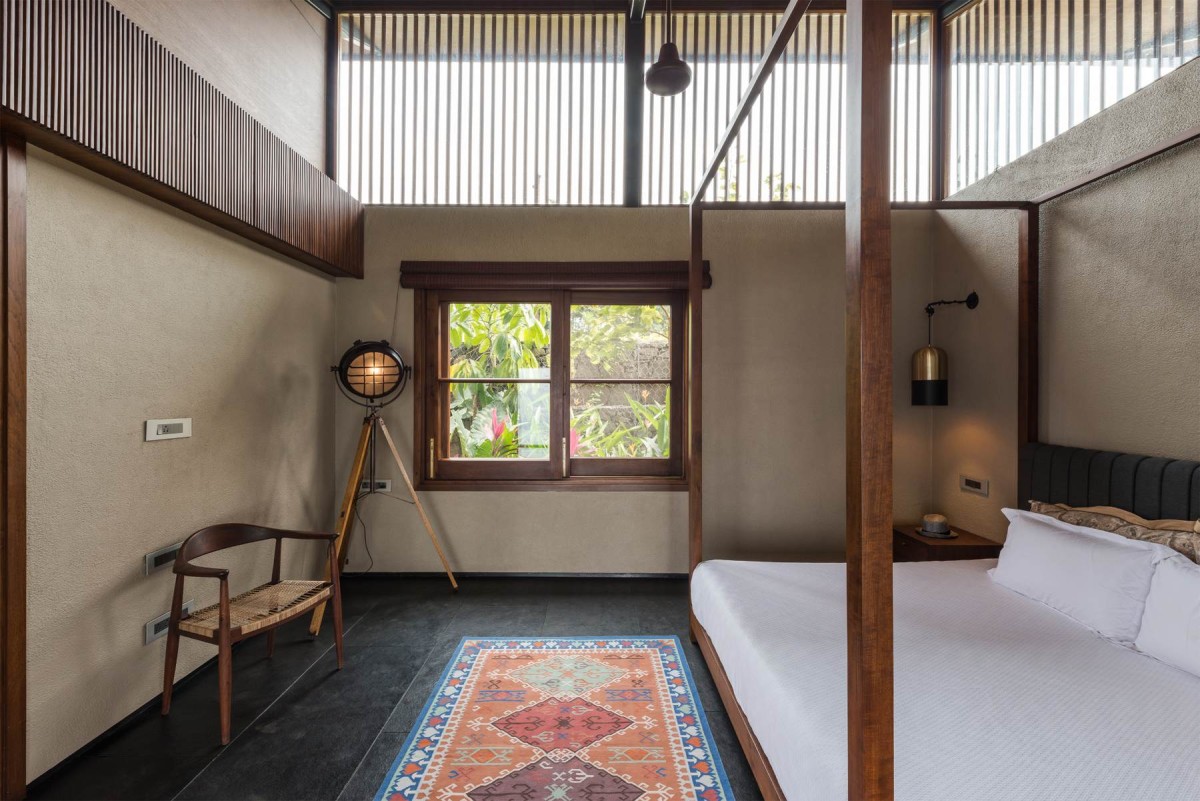 Bedroom 2 of The House with the Gabion by SPASM Design Architects