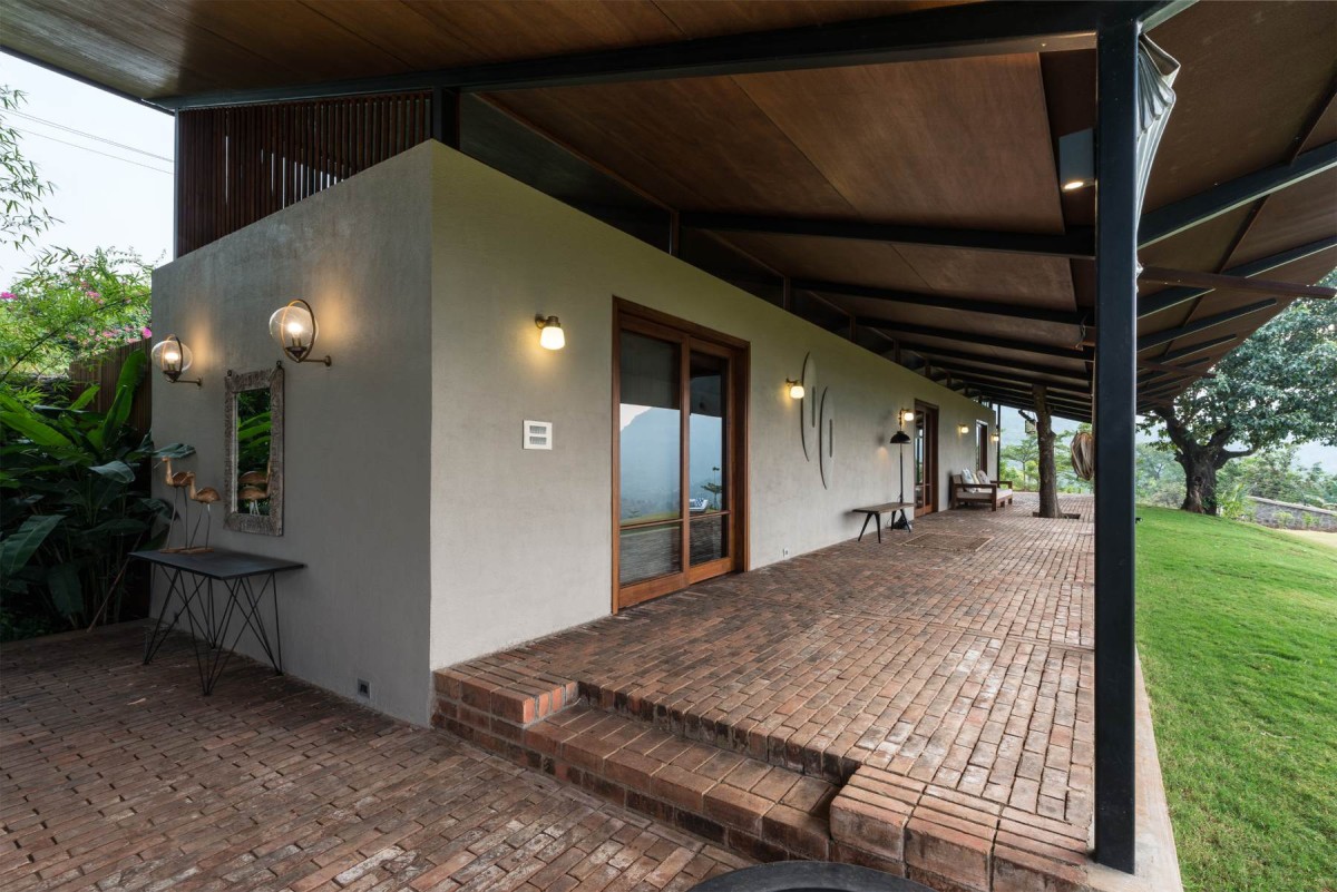 Verandah of The House with the Gabion by SPASM Design Architects