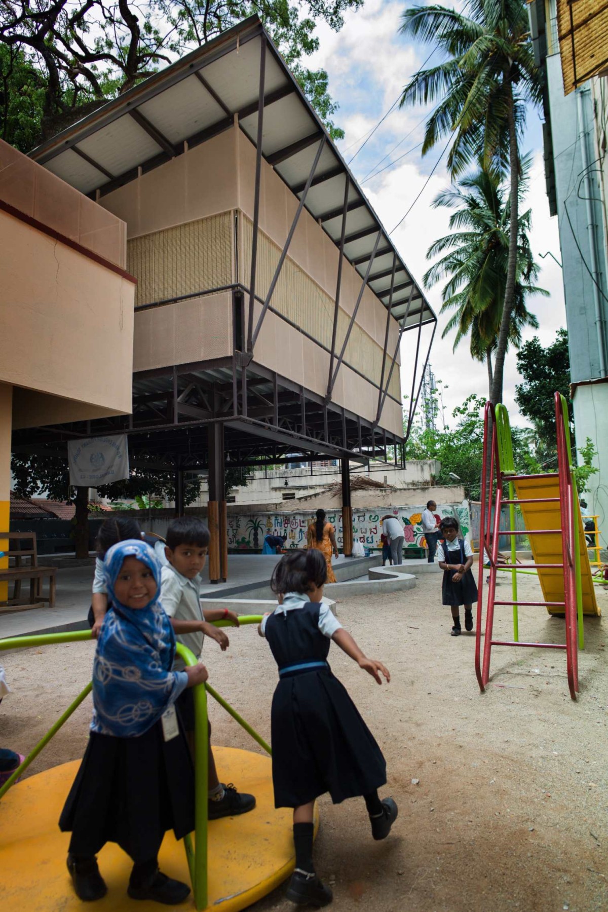 View from play area of RBANMS School by Mathew and Ghosh Architects