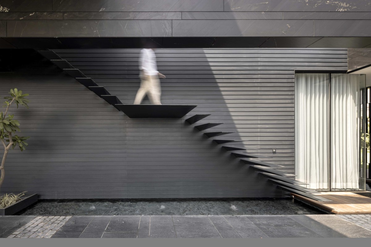 Outdoor staircase of RB 182 by Minimalist Architecture & Design Studio