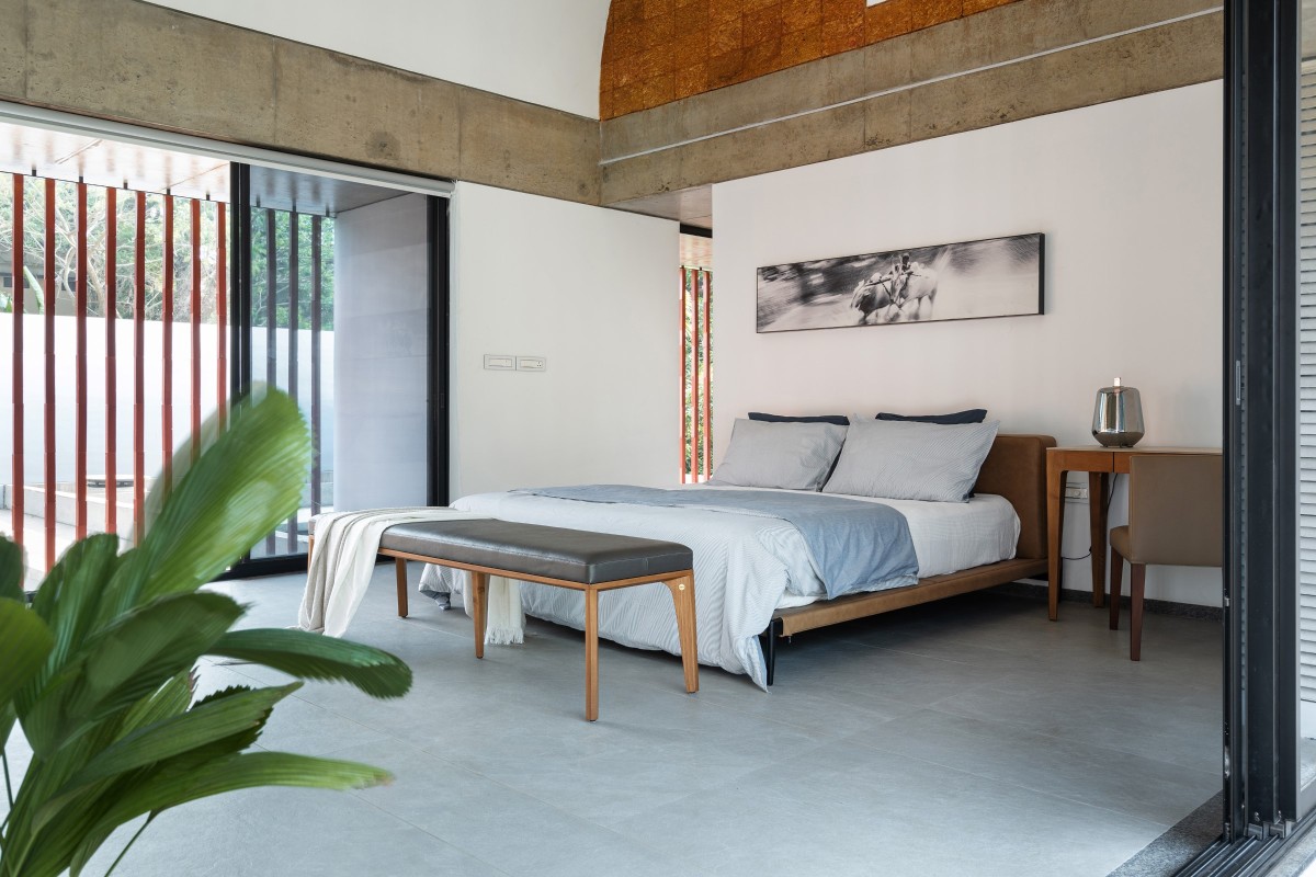 Master Bedroom of The Stoic Wall Residence by LIJO.RENY.architects