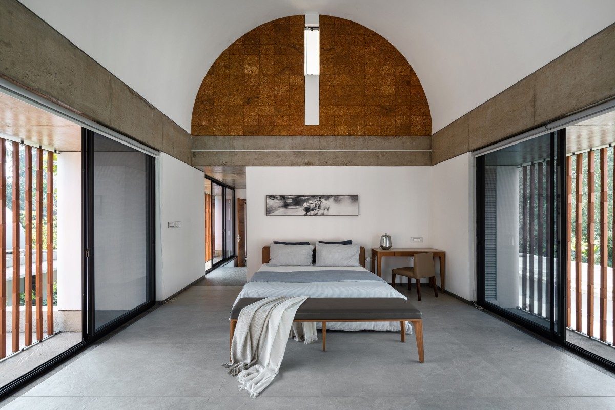 Master Bedroom of The Stoic Wall Residence by LIJO.RENY.architects