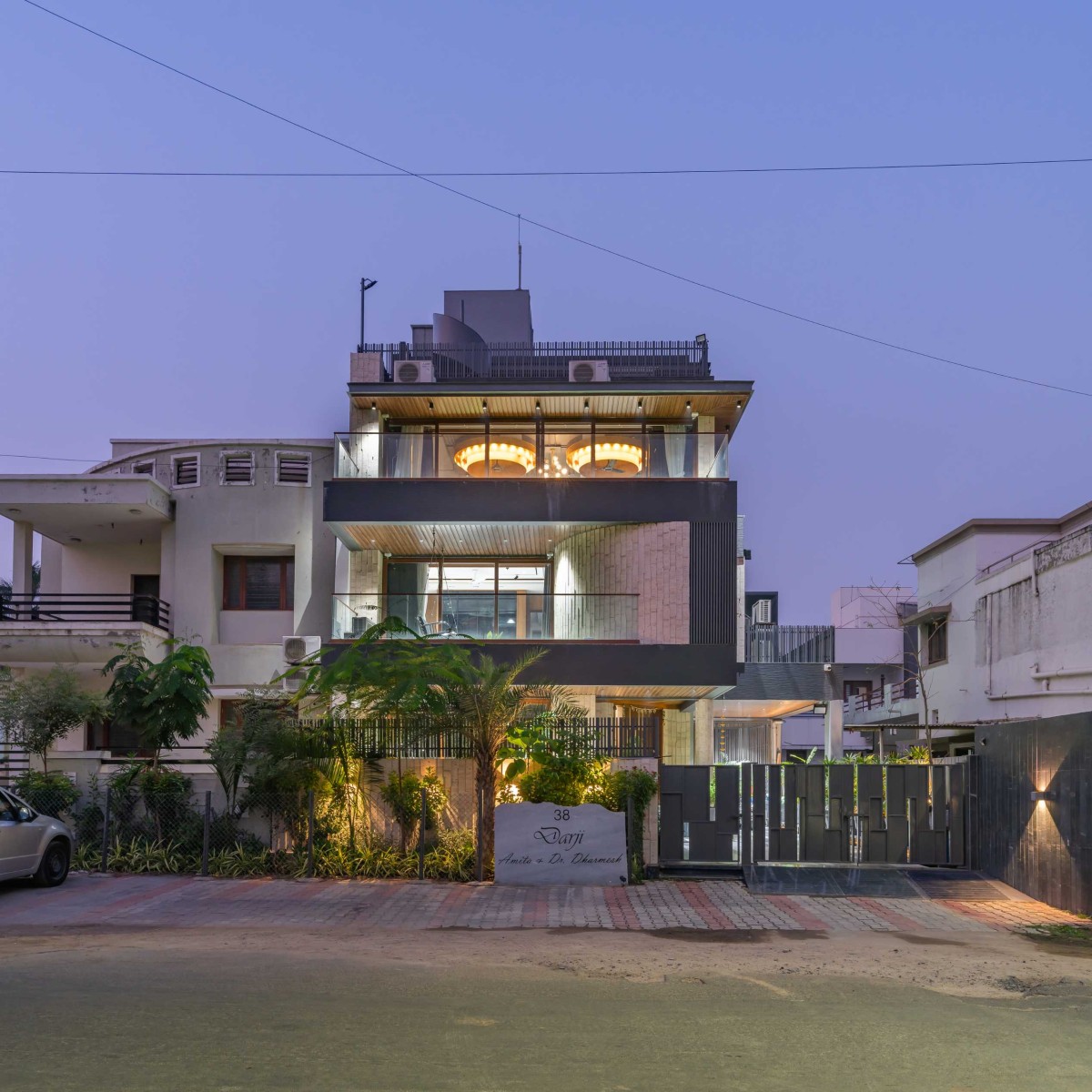 Dusk light exterior view of Dr. Dharmesh Darji Villa by Vihar Fadia Architects