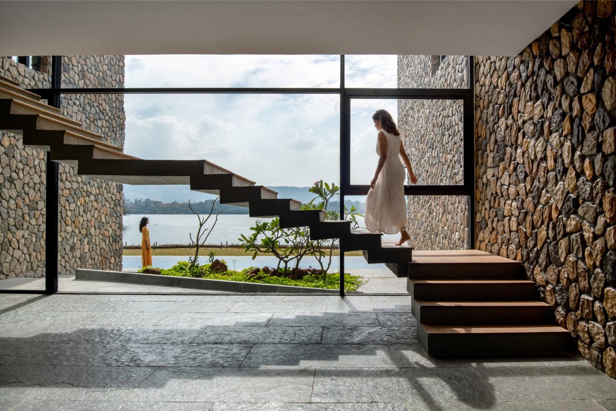 Floating staircase of House by the Lake by Kaviar Collaborative