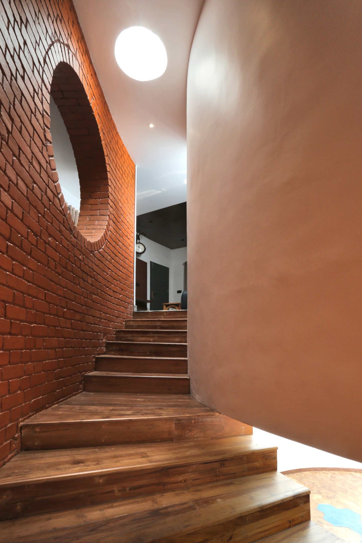 Staircase of The Skyward Home by S Squared Architects