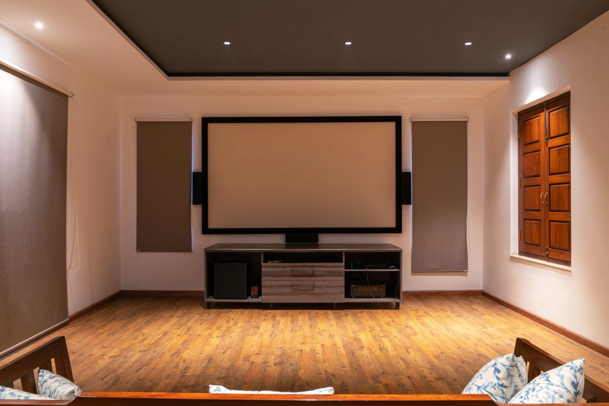 Home Theater of Stack House by Vishwakarma Design Studio