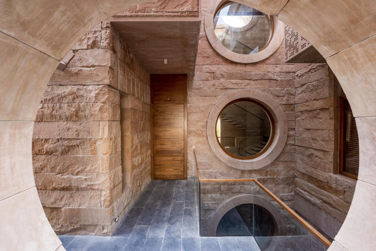 Entrance of Stone House by Malik Architecture