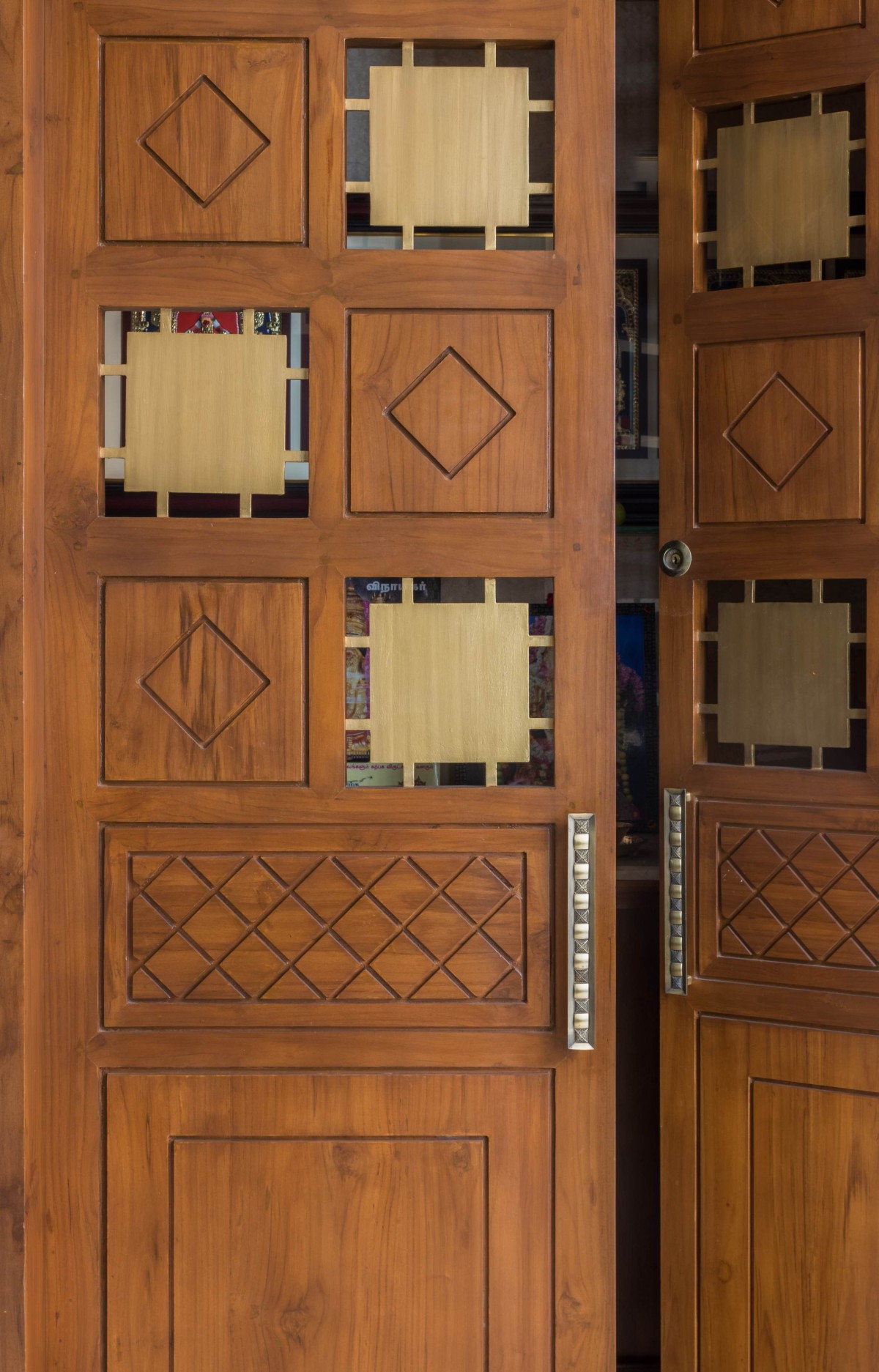 Detailed shot of Mandir Door of Urban Insert by SVK Associates