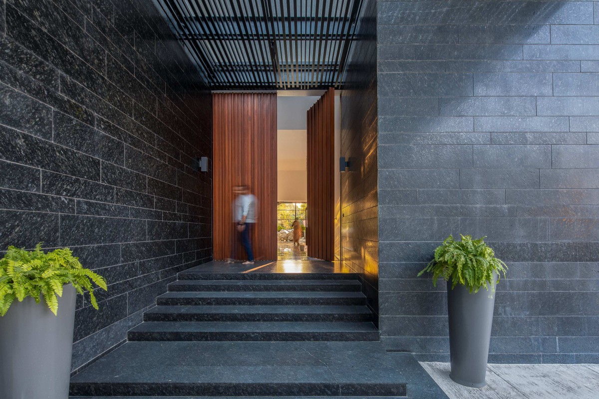 Entrance of Black Bastion House by SPASM Design Architects