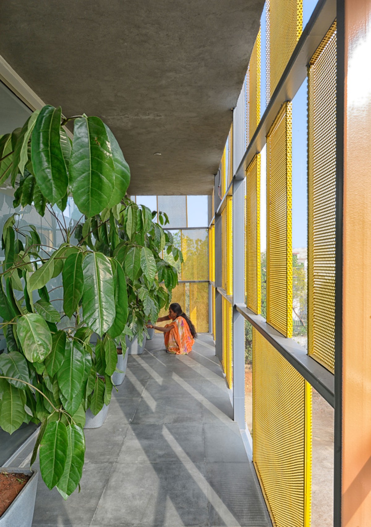 Outdoor green space of MGB Headquaters by Spacefiction Studio