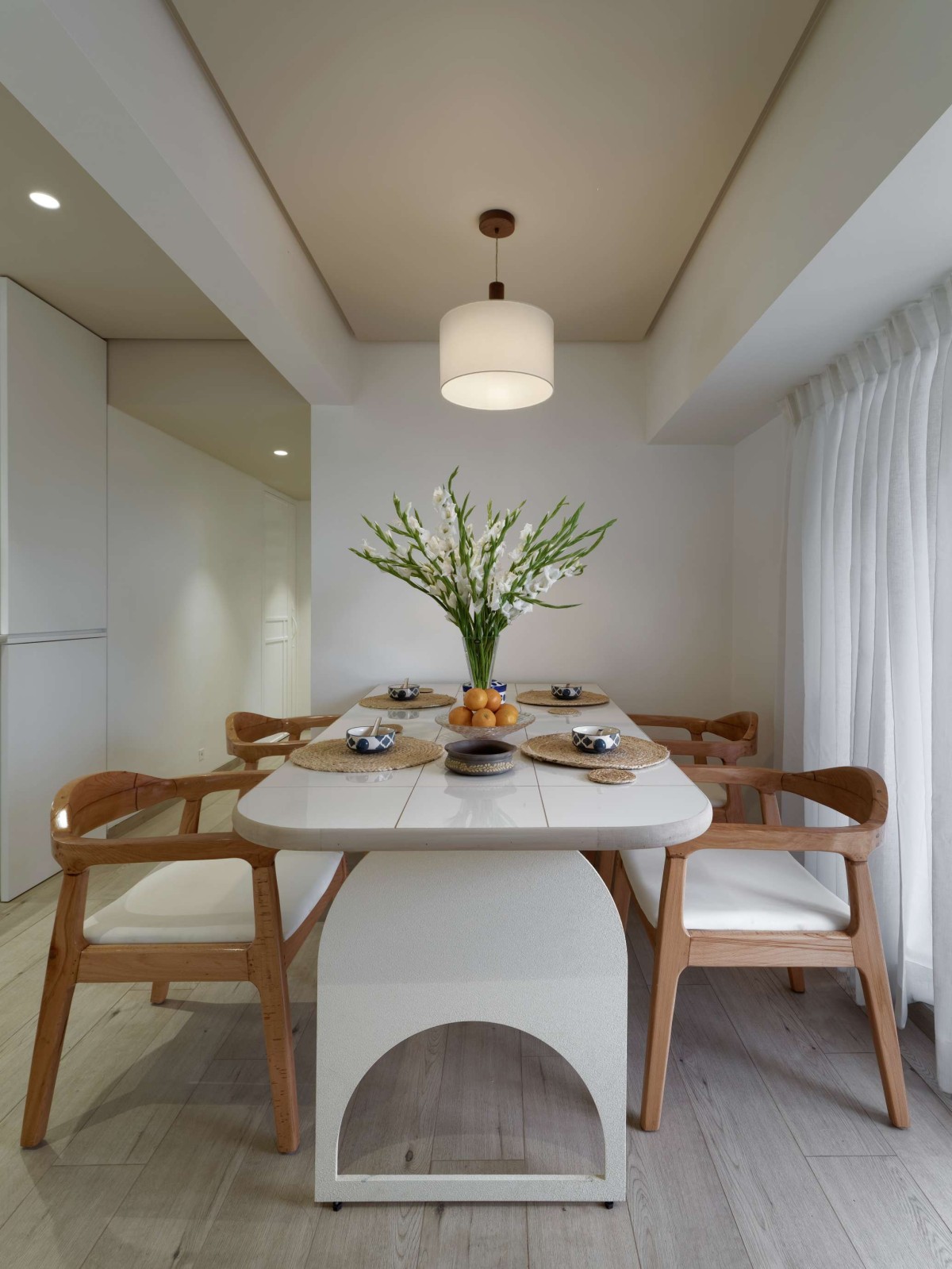 Dining of White Home by Element9 Design Studio