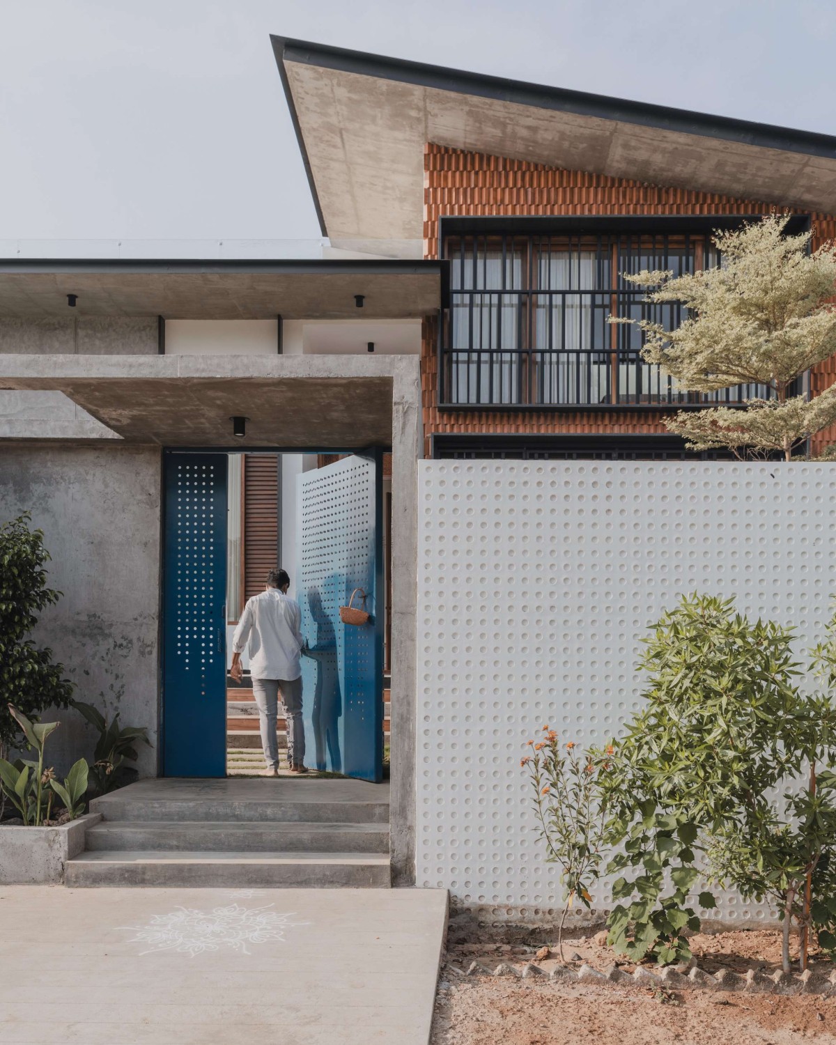 Entrance of A House In The Farm by Studio MOB