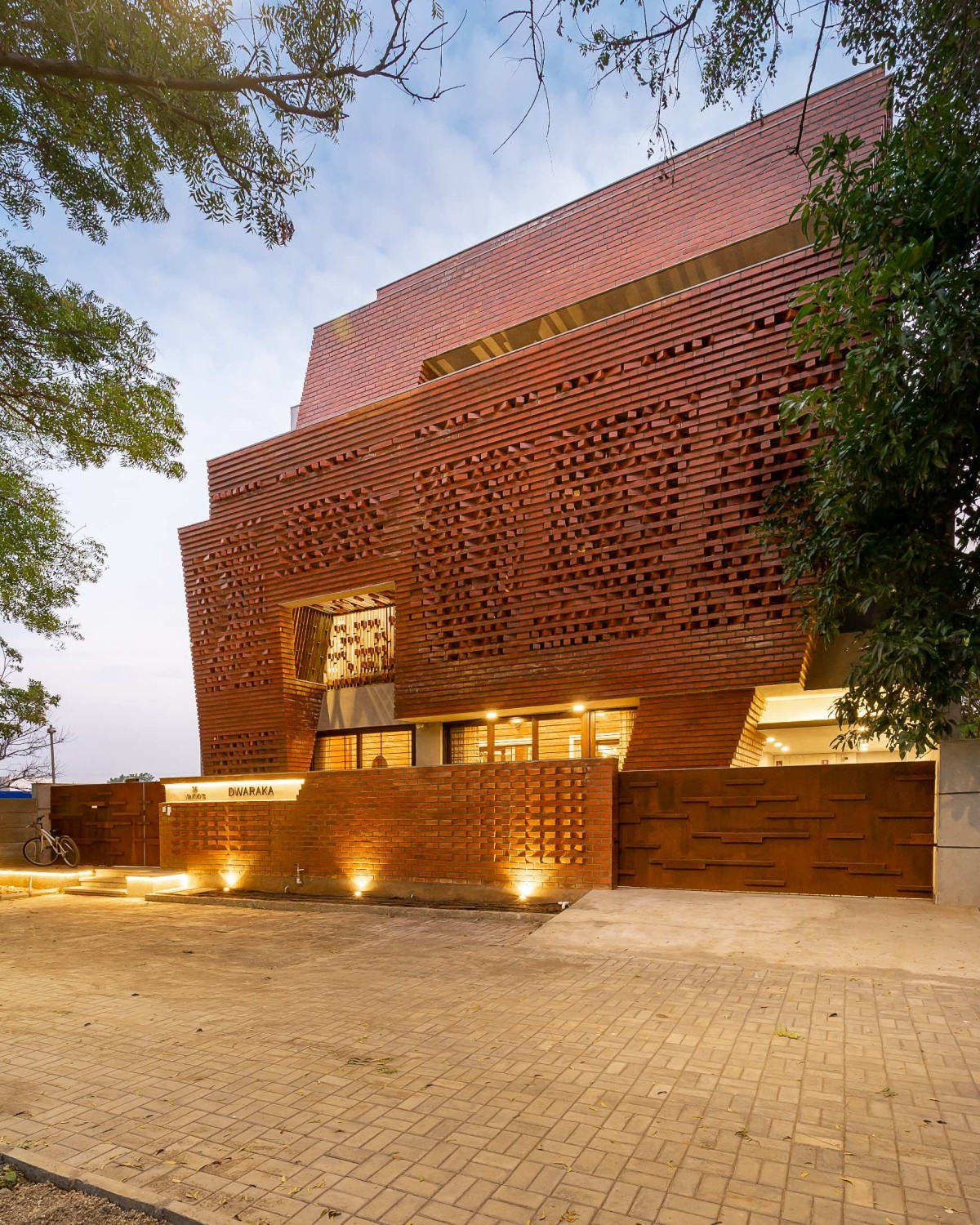 Dusk light exterior view of Vinod Residence by Murali Architects