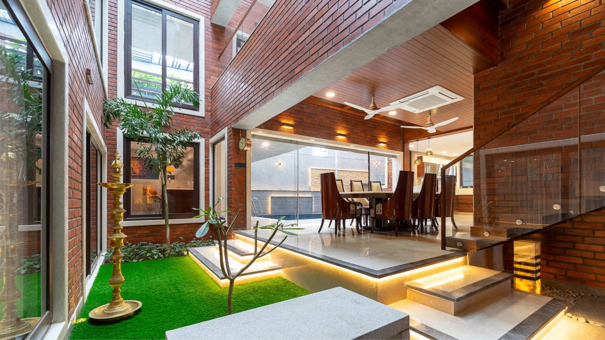 Pooja Court of Vinod Residence by Murali Architects