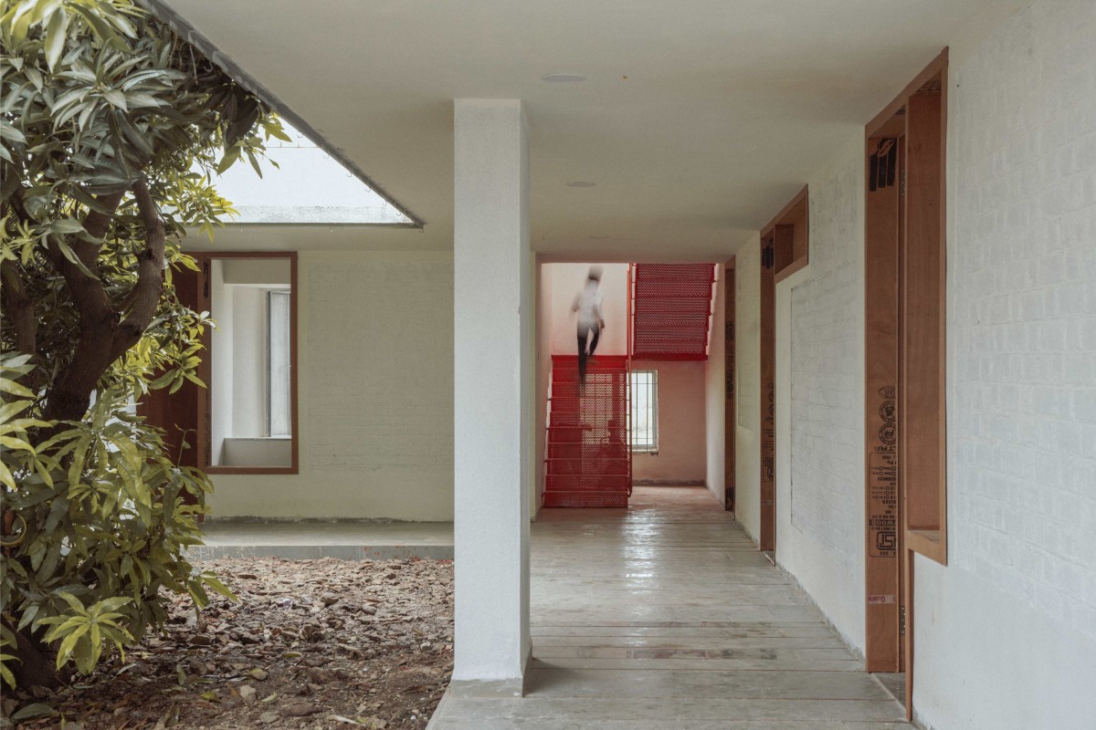 Passage to staircase of House of Tranquil Rooms by Craft Narrative