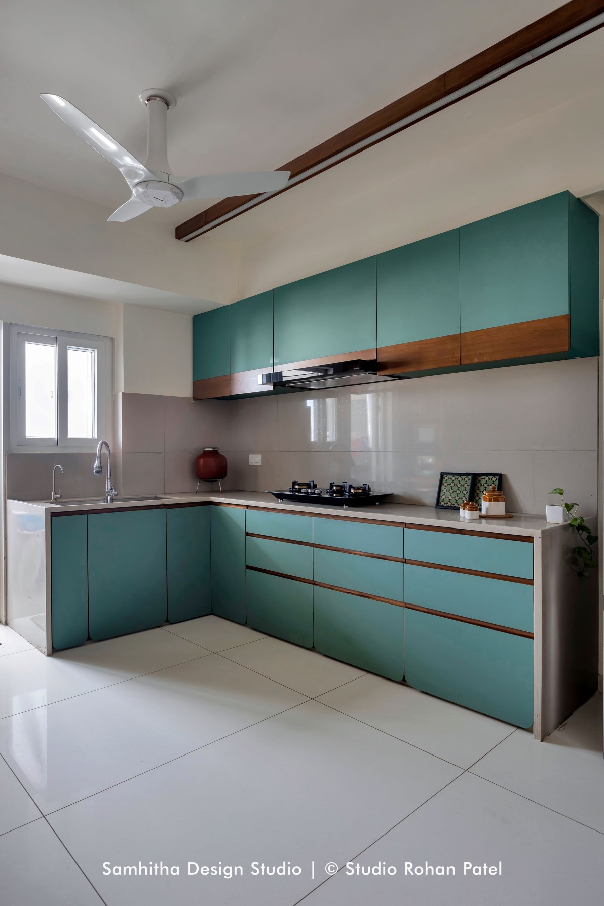 Kitchen of Manjalpur Residence by Samhitha Design Studio