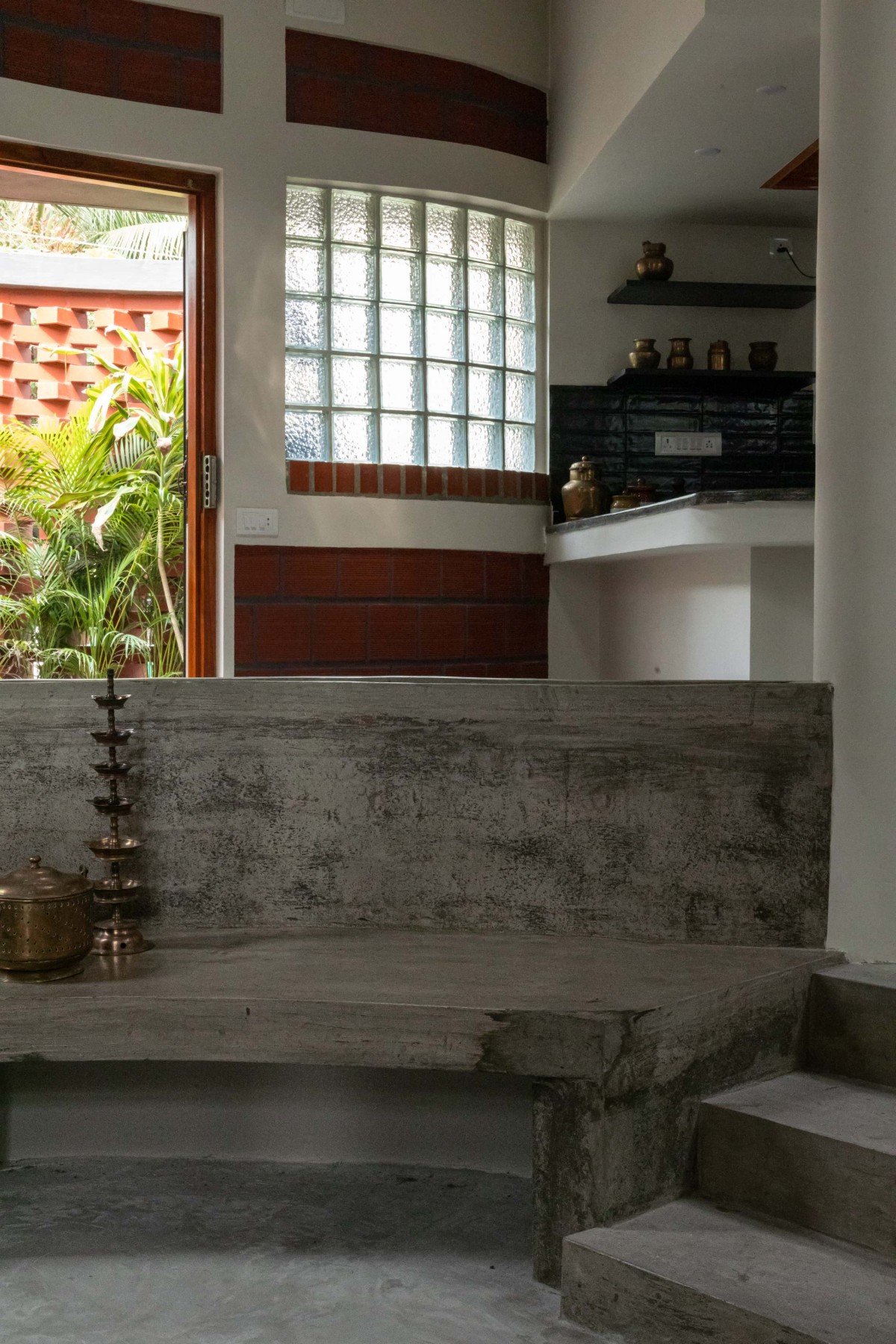 Kitchen view for living room of Red House by Kosh Studios