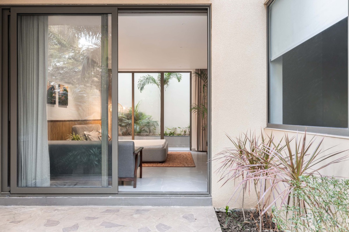 Bedroom view from court of Vault House by Sifti Design Studio