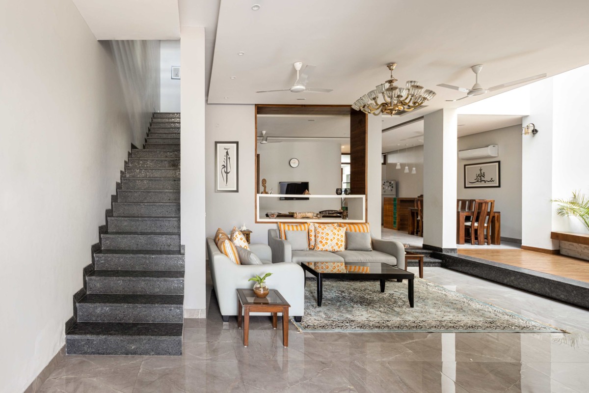 Living room and Staircase of The Framed House by ForumAdvaita