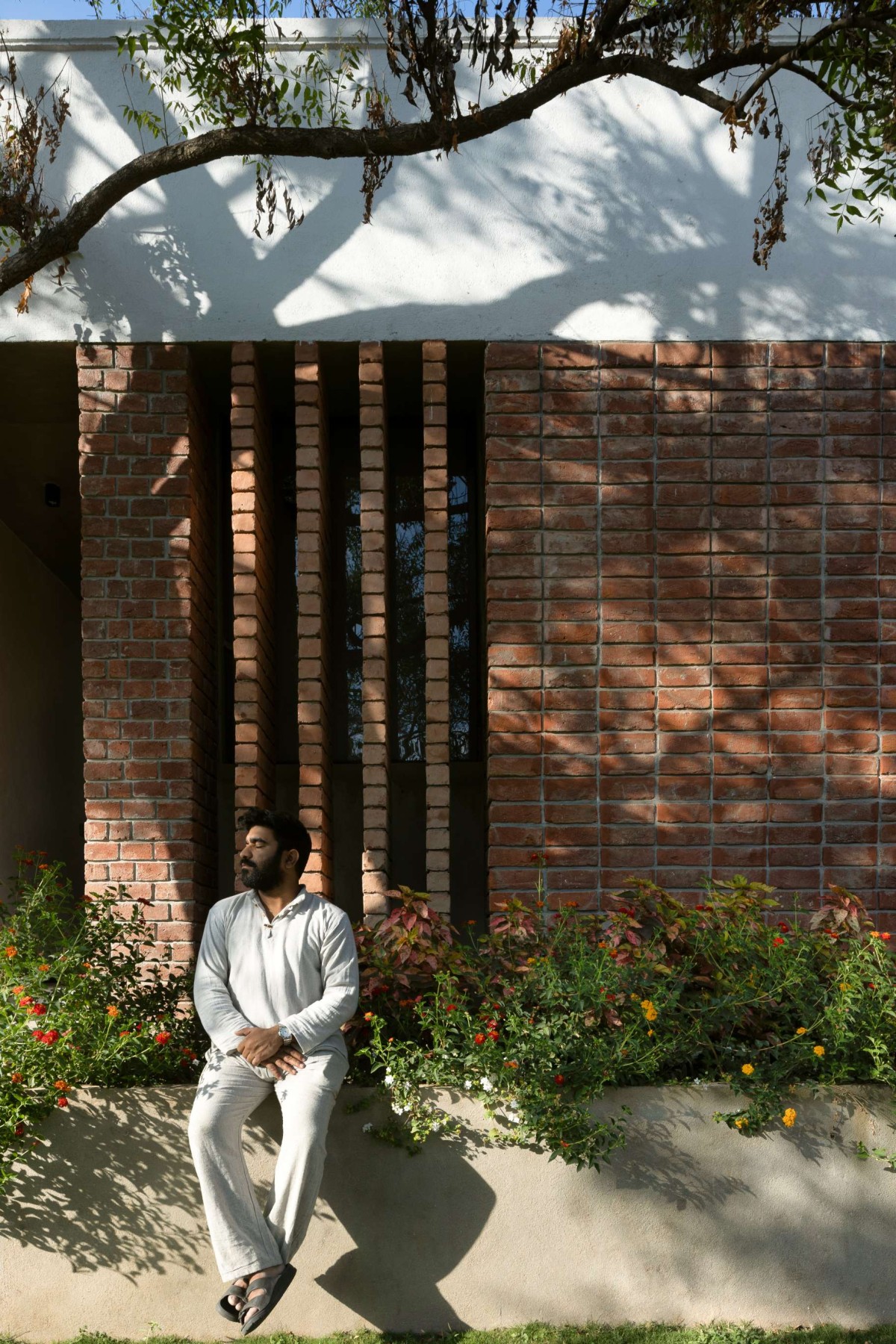 Detailed shot of brick wall of Cezara Holiday Home by KUN Studio