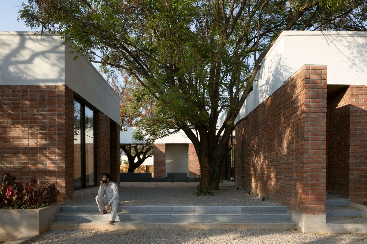 Outdoor Courtyard of Cezara Holiday Home by KUN Studio