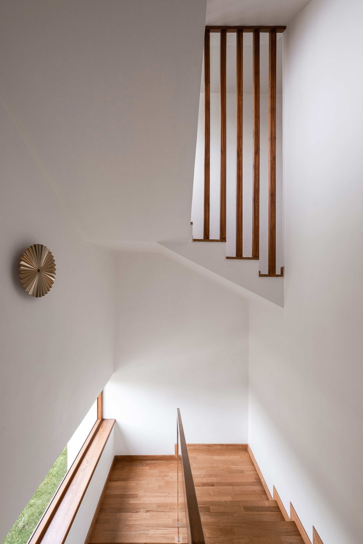 The eccentric design of the staircase creates a visual delight