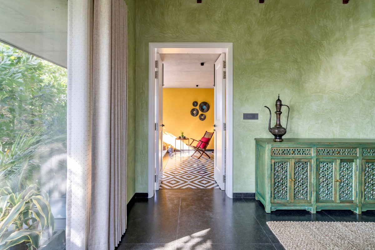 Bedroom to balcony view of Jain Residence by Associated Architects (i) Pvt. Ltd.