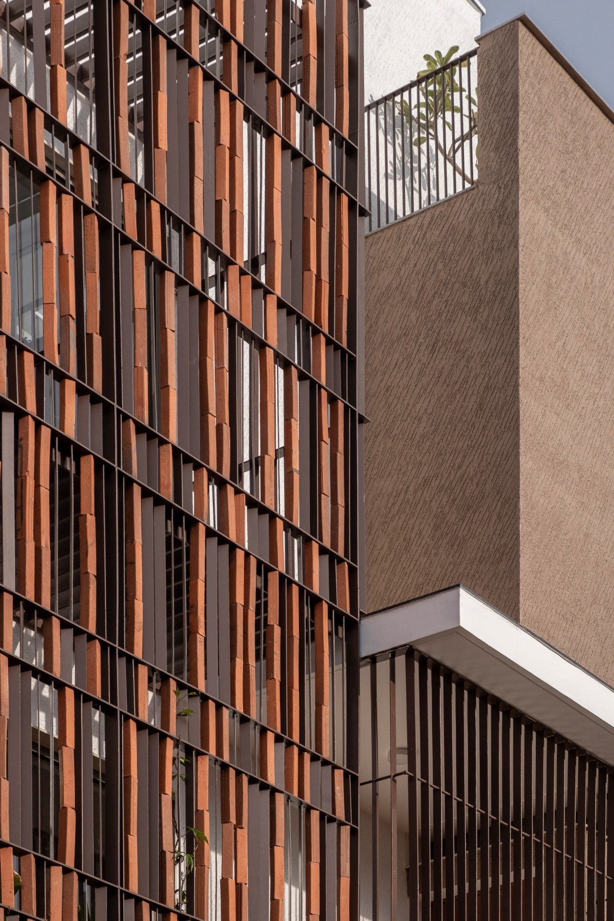 Detailed shot of external facade of One Ground Home by Shanmugam Associates