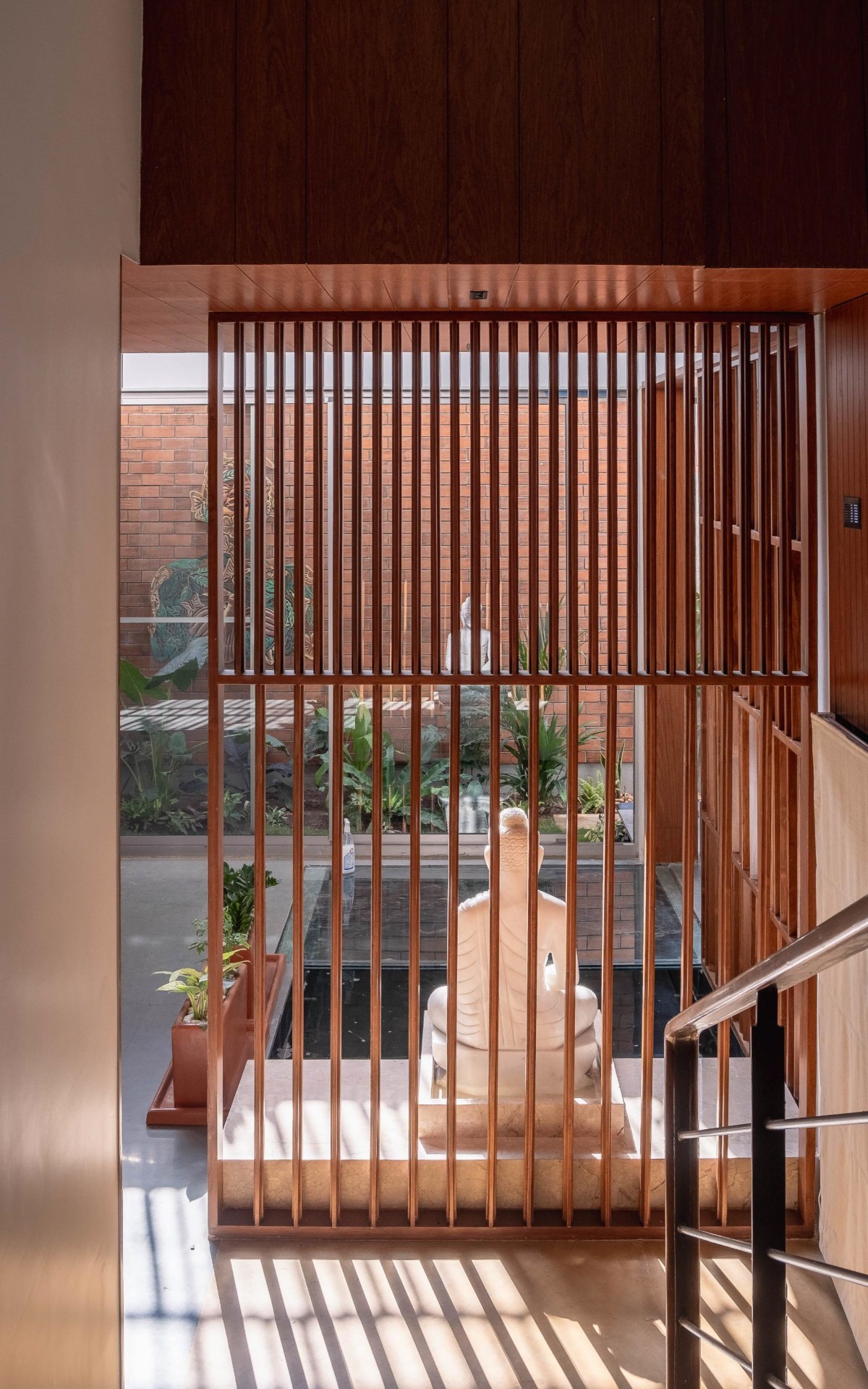 View from staircase of One Ground Home by Shanmugam Associates