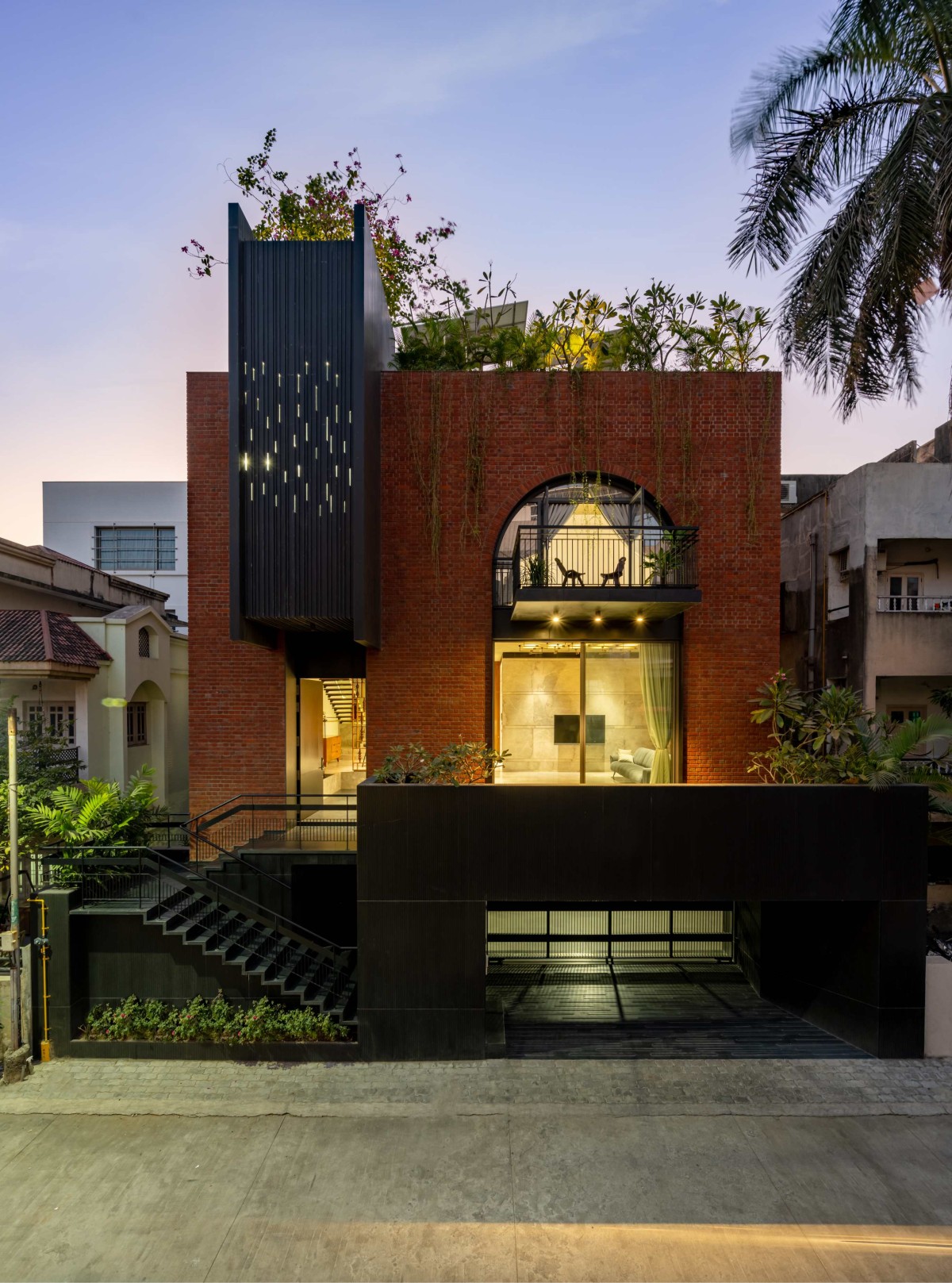 Dusk light exterior view of SV House by Design Work Group