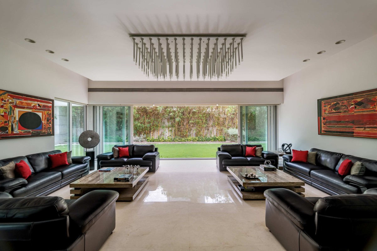 Living room of Lakhani Villa by INI Design Studio